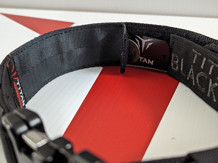 Close-up of the hidden AirTag pocket inside the Black Ops Dog Collar
